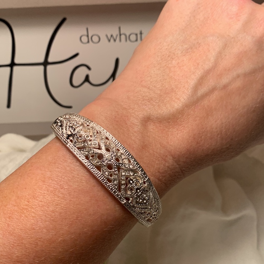 Silver hinged bangle bracelet filigree hearts clear rhinestones rhodium plated?